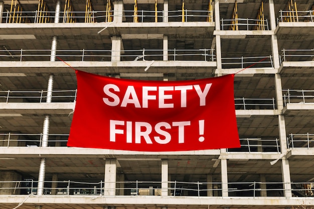 Safety first sign  on building