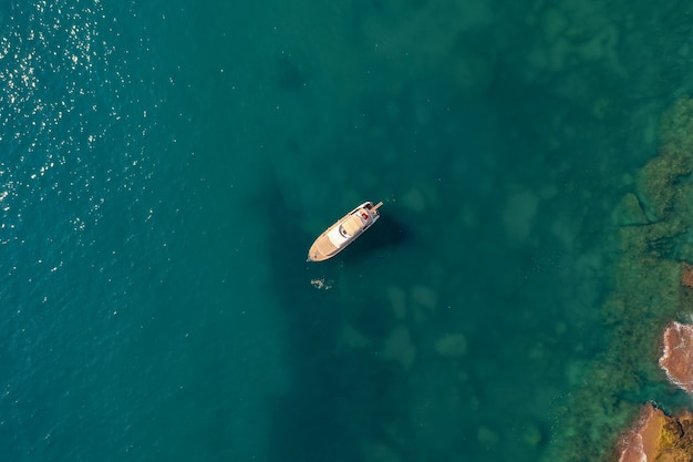 Sailboat in the sea in the evening sunlight over beautiful sea, luxury summer adventure, active vacation in Mediterranean sea, Turkey