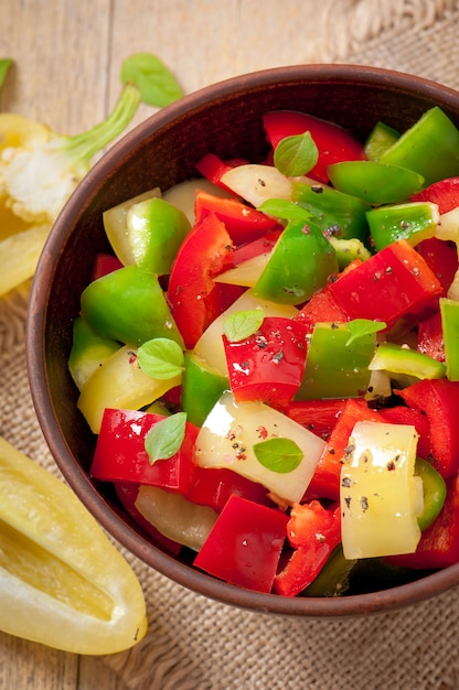 Salad of sweet colorful peppers with olive oil