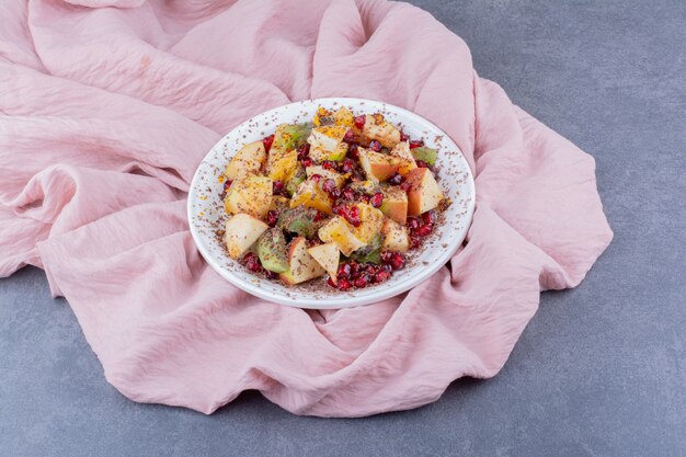 Salad with chopped fruits and spices