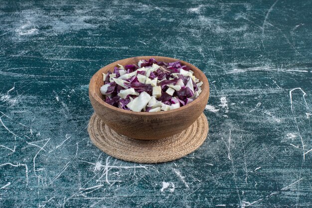 Salad with chopped purple cabbages and white cauliflowers. 