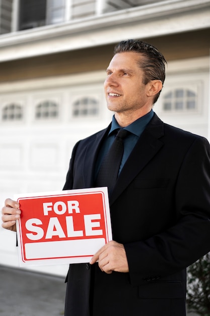 Sale agent preparing for presenting house