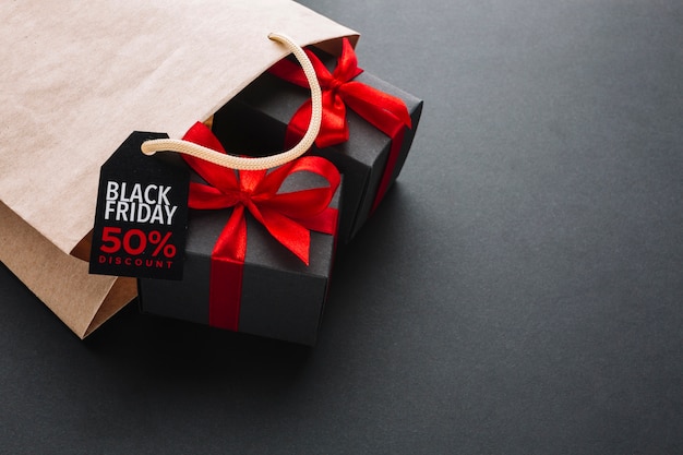 Free photo sale paper bag with presents close-up