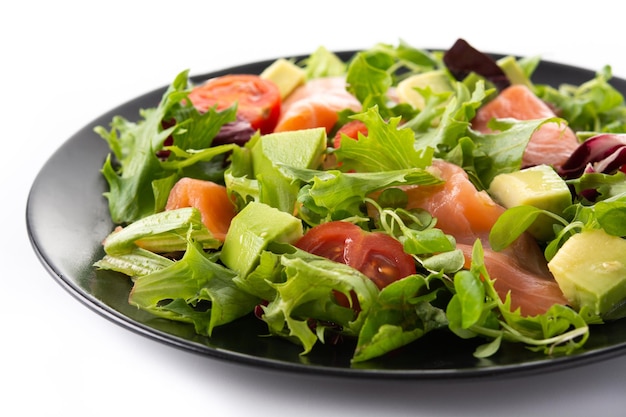 Free photo salmon and avocado salad isolated on white background