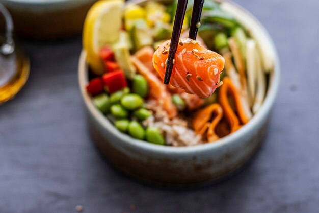 Salmon on rice poke bowl photography