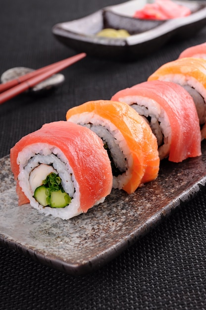 Salmon sushi roll on a plate