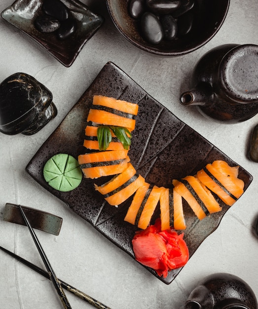 salmon sushi with ginger and wasabi