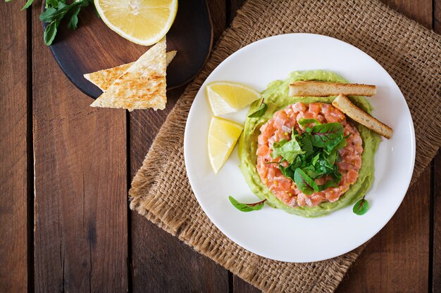 Salmon Tartare with avocado mousse.