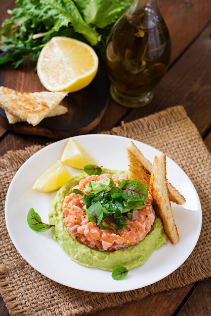 Salmon Tartare with avocado mousse.