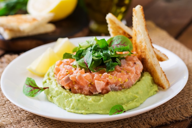 Salmon Tartare with avocado mousse.