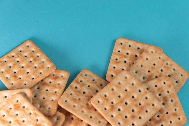 Salt crackers on the blue background