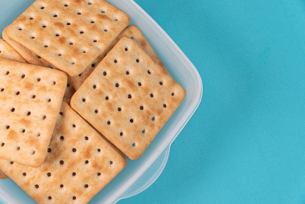 Salt crackers on the blue background