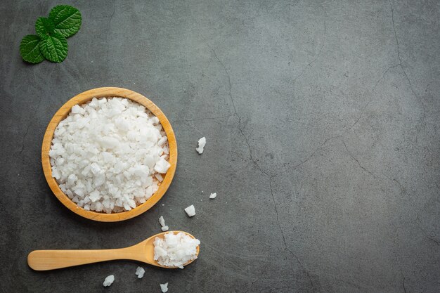 salt in wooden small plate