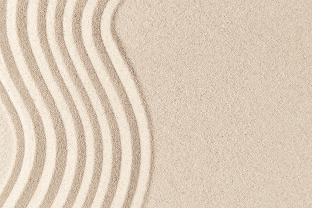 Free photo sand surface texture background zen and peace concept