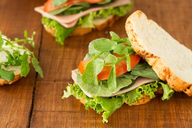 Free photo sandwich with cucumber on table