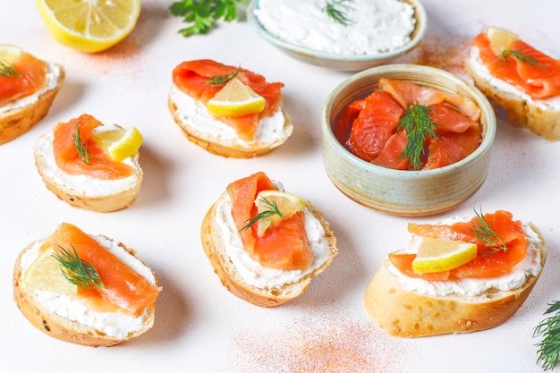 Sandwiches with smoked salmon and cream cheese and dill.