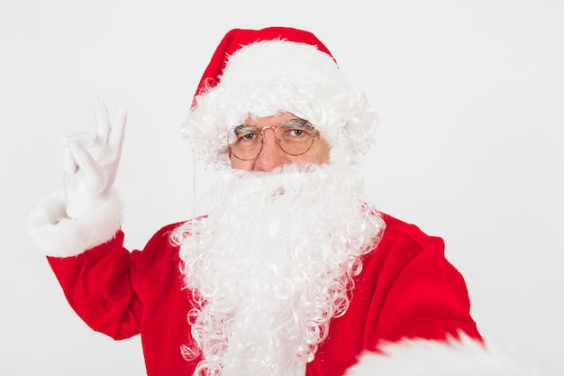 Free photo santa claus making selfie