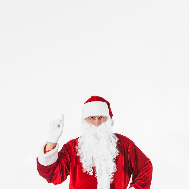 Free Photo santa claus showing hand with pointing finger 