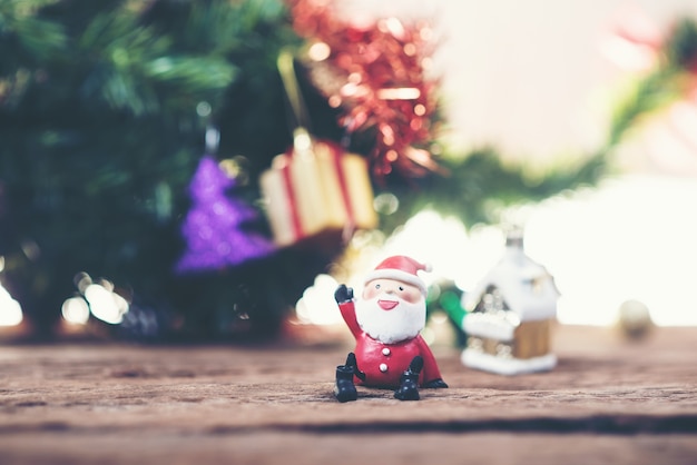 Free photo santa claus toy with blurred background