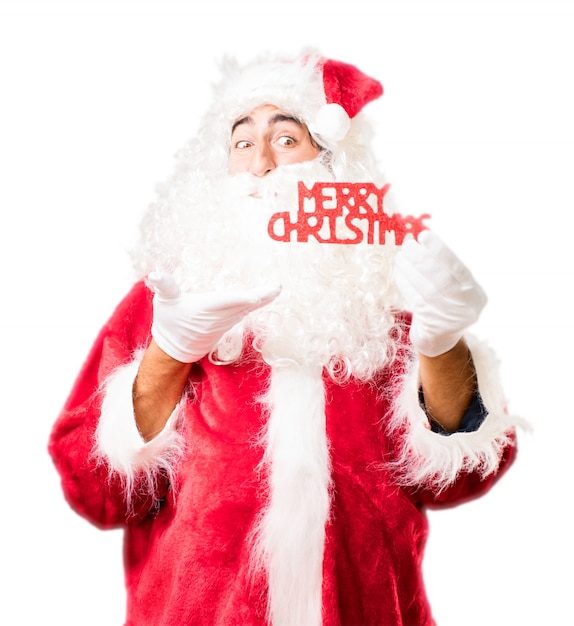 Free Photo santa with lyrics that say "merry christmas"