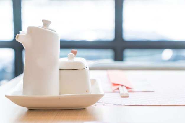 sauce bottle on table in restaurant