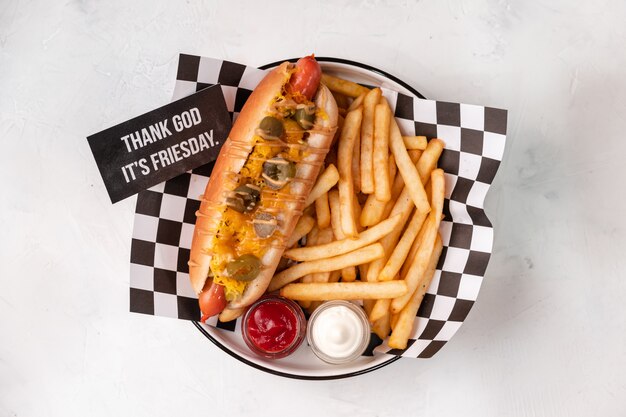 sausage sandwich with cheese and french fries