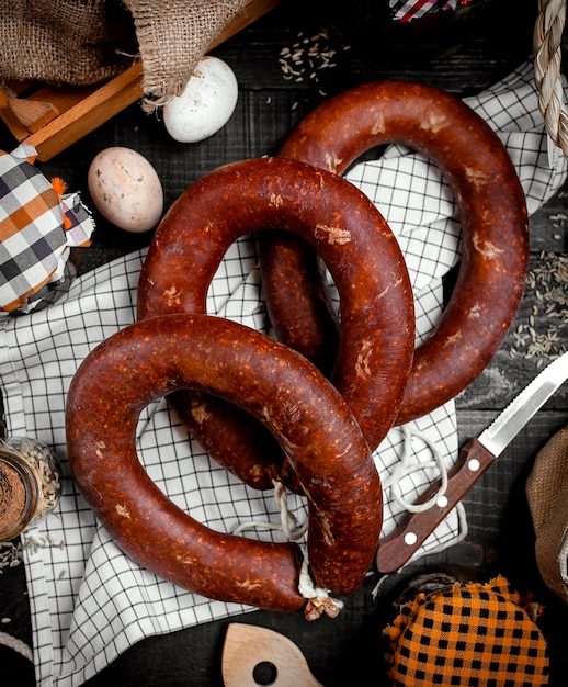 Free photo sausage on the table top view