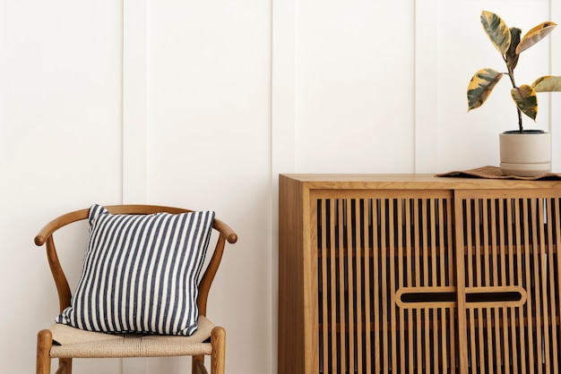 Free photo scandinavian style sideboard with a chair