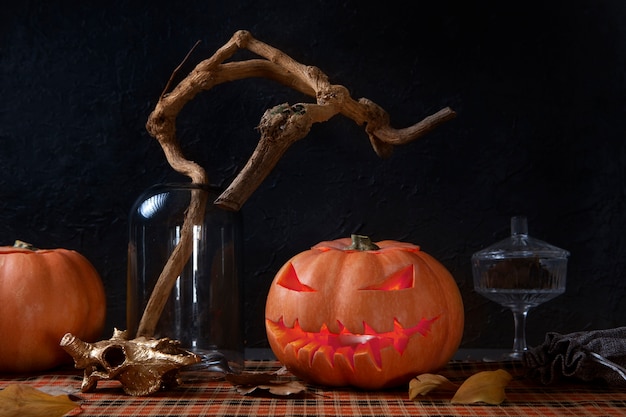 Free Photo scary halloween carved pumpkin lantern with spooky face