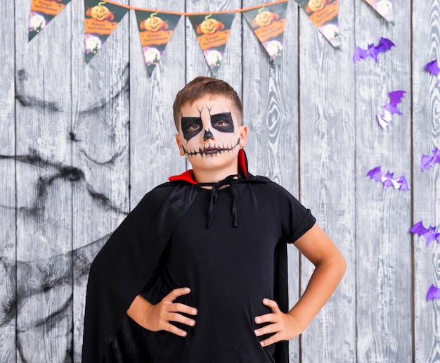 Free Photo scary young boy in halloween costume