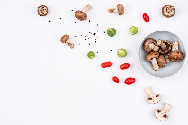 scattered colorful little vegetables on right part of the frame