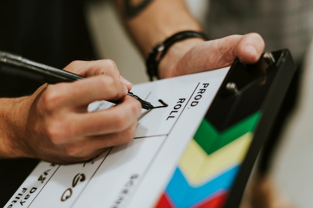 Free photo behind the scenes with a clapper board