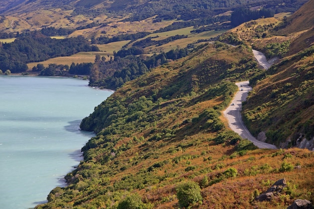 Scenic lake road through the mountains in New Zealand