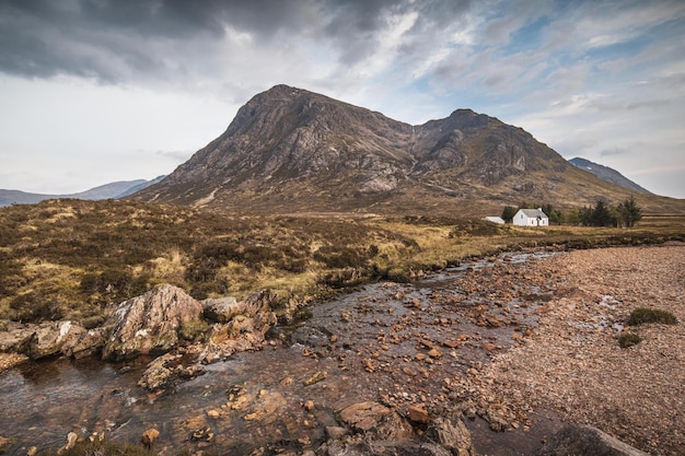 Scenic view of the Devil's Staircase mountain landscape in Scotland during a gloomy sky