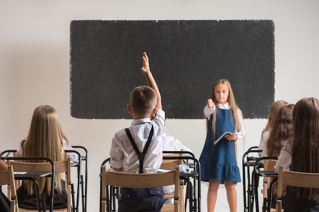 Free Photo school children in classroom at lesson