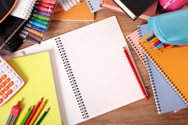 School desk with open notebook 