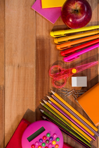 School essentials on wooden table