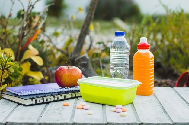 School pack of lunch and notepads