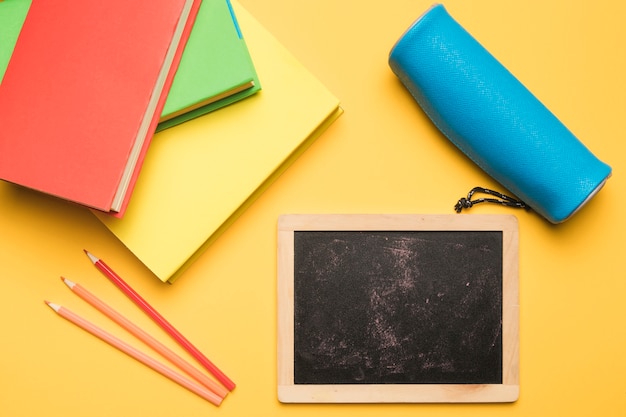 School stationery on yellow background