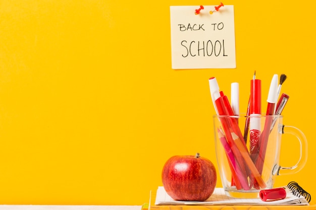 Free photo school supplies on orange background