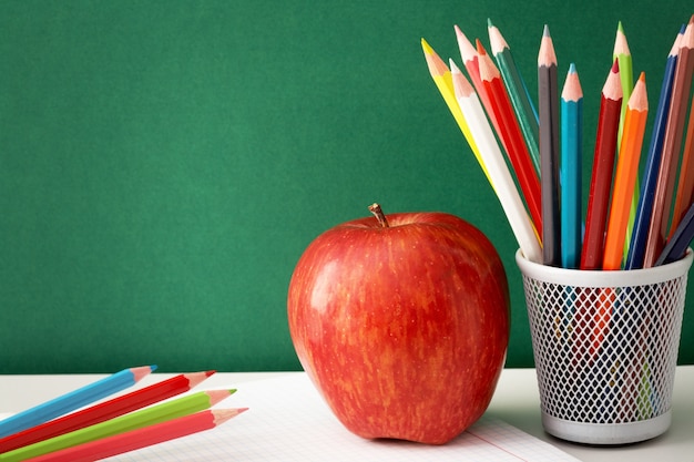 School supplies with blackboard background