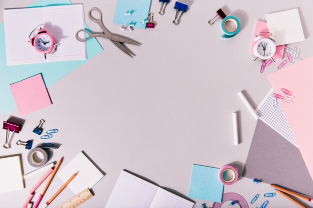 School womanish writing accessories and other stationery form a circle