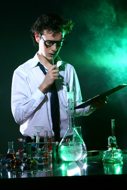 Scientific doing chemical experiment