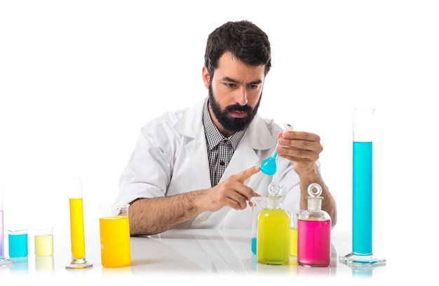 Free Photo scientist man with test tubes