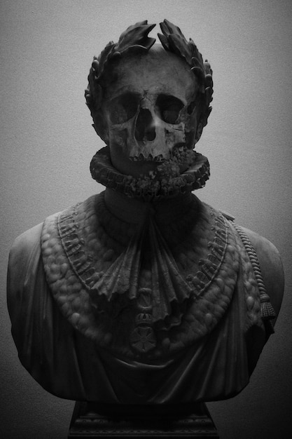 Sculpture with skull face in black and white