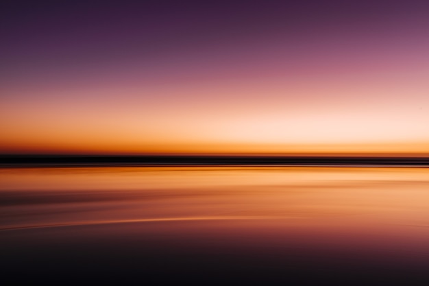 Free Photo sea during a colorful sunset with a long exposure