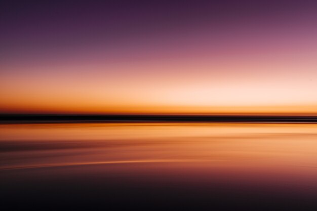 Sea during a colorful sunset with a long exposure