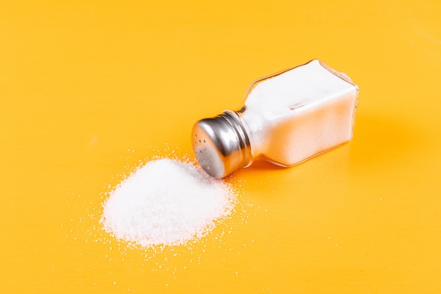 Sea salt coming out of salt shaker