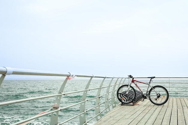 Free photo sea view with bicycle space for text