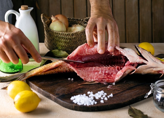 Free photo seafood cleaning process in the kitchen